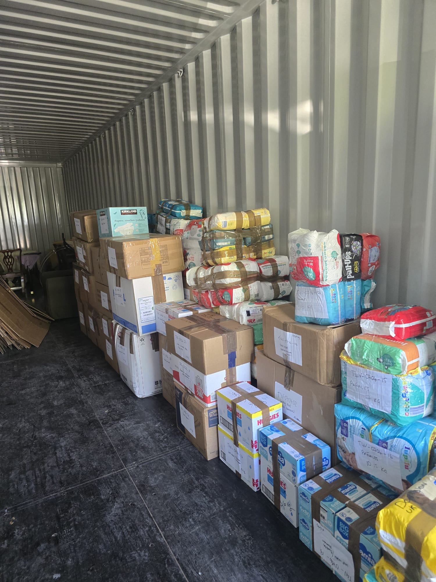 Volunteers hard at work preparing donations.